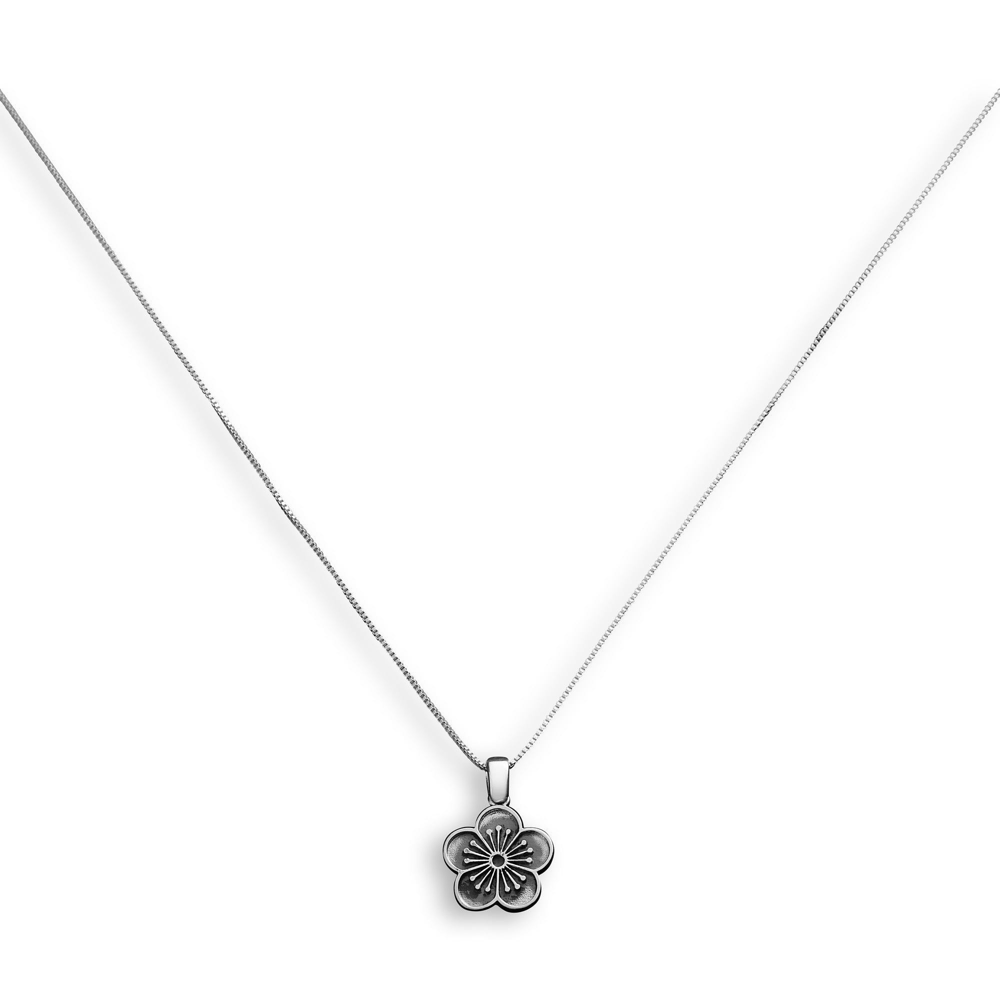 Pendant with small silver and gold leaf dome on silver chain
